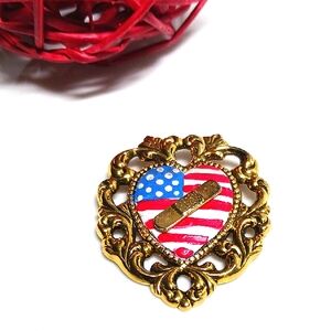 Heart-Shaped Gold and Red Filigree Flag Band-Aid Brooch